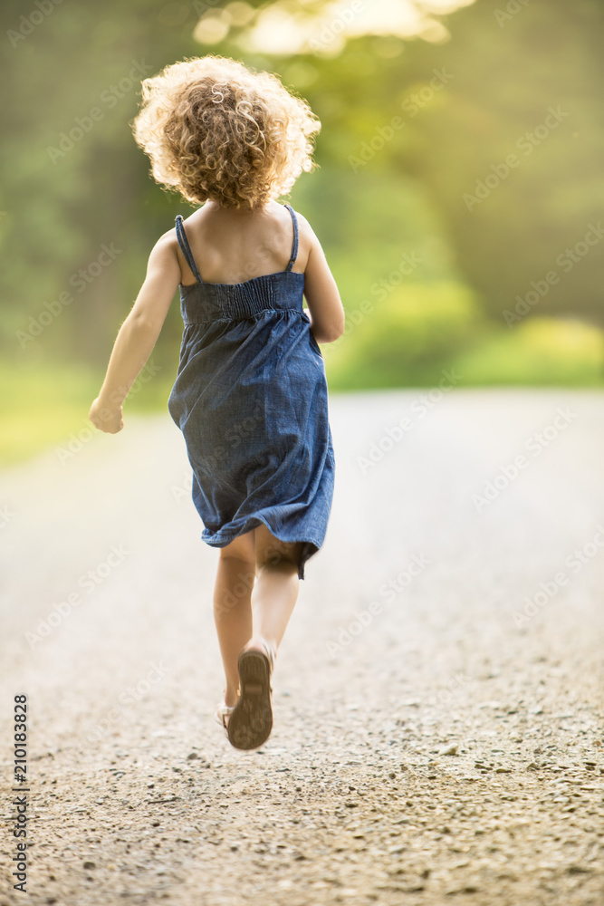 Little Girl Running Away Down Raod Alone Stock Photo Adobe Stock