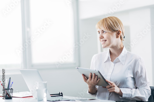 Young employee working at desk