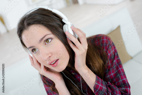 female teenager listening to the music