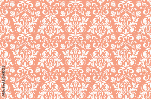 Wallpaper in the style of Baroque. A seamless vector background. White and pink floral ornament. Graphic pattern for fabric, wallpaper, packaging. Ornate Damask flower ornament