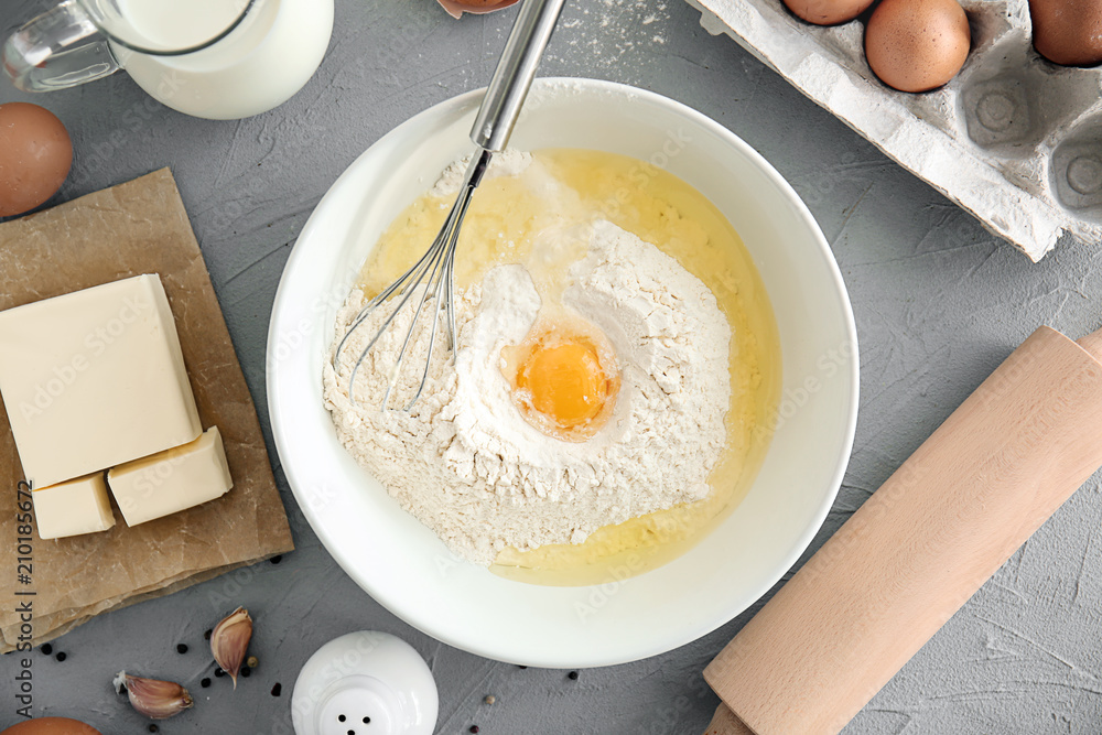 Flat lay composition with kitchen utensils and products on grey background. Bakery workshop Flat lay composition with kitchen utensils and products on grey background. Bakery workshop