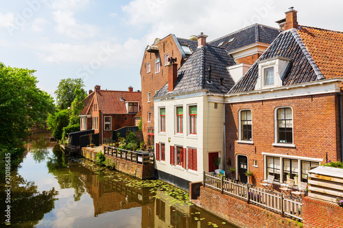 canal with old buildings in Appingedam, Netherlands
