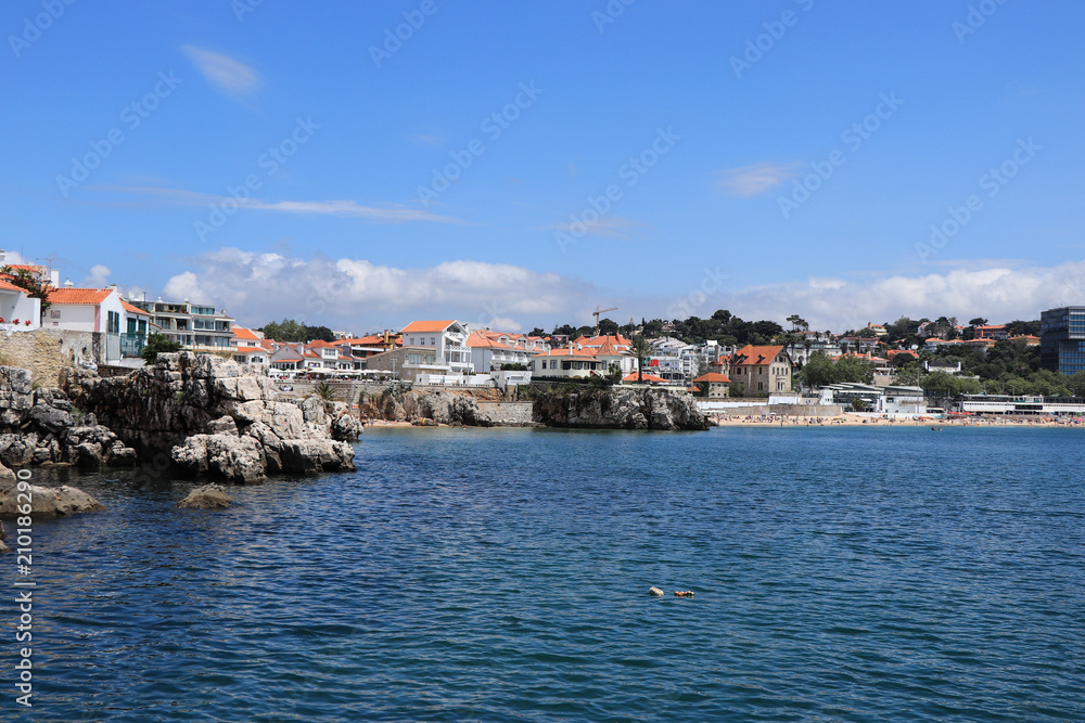 View of the beautiful Cascais bay. W|ith the town of Cascais in background in a summer day. Cascais, Portugal June 2018