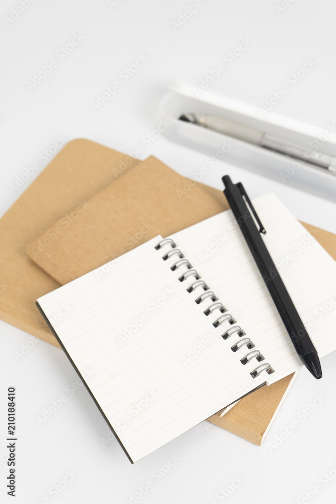 Stationery set such as Note books and Pens on white background. Stationery set such as Note books and Pens on white background.