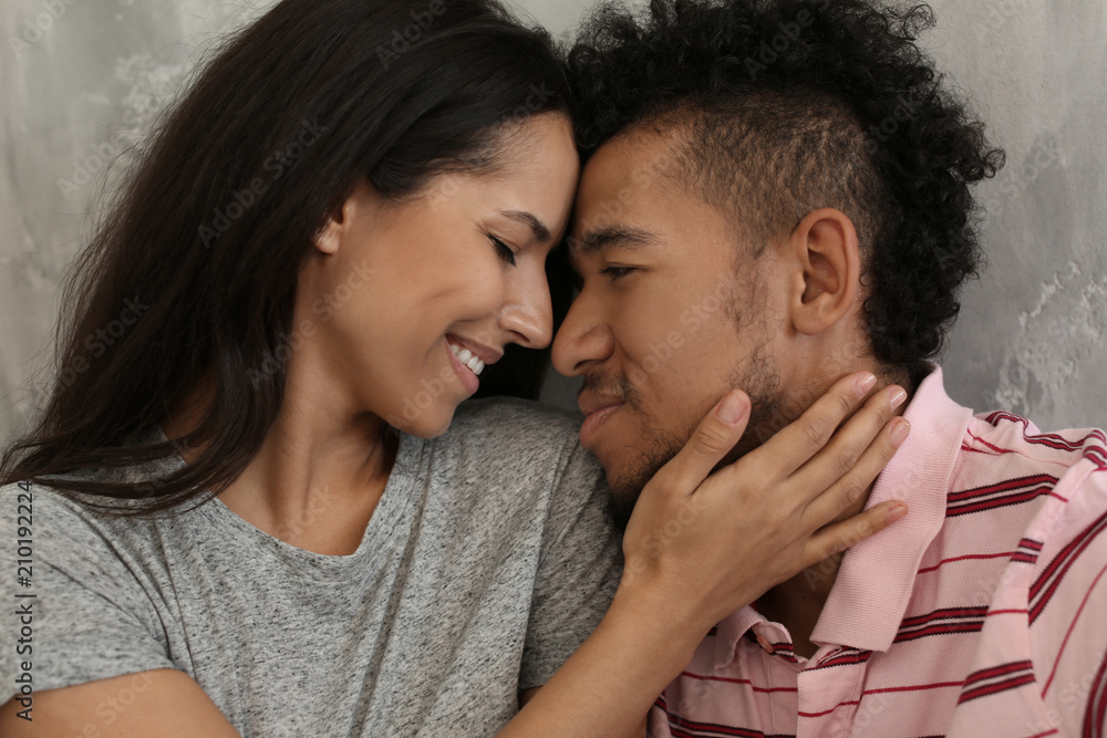 Happy African-American couple indoors Happy African-American couple indoors