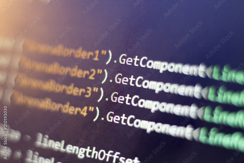 Obraz premium Software development C-Sharp (C#, .NET) code close up. Macro shot of game developer screen. Abstract information technology modern background.
