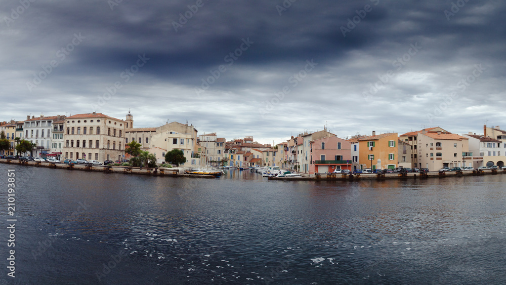 Canal in Venice and houses. Panorama