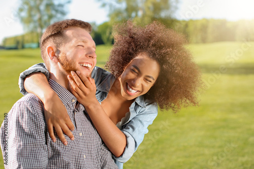 Young loving interracial co...