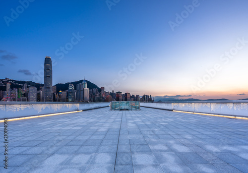 empty square with panoramic city skyline