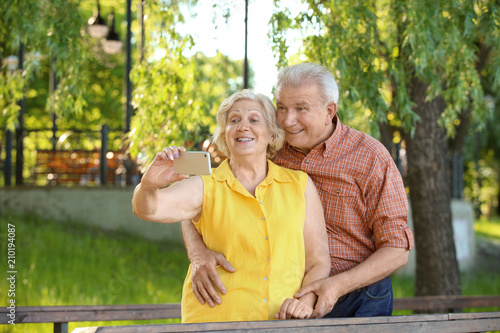 Happy mature couple taking ...