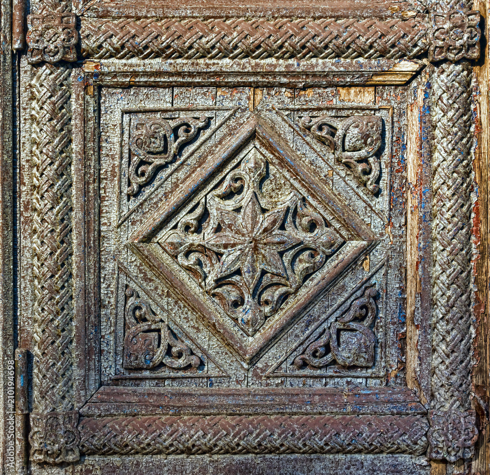 Fragment of wooden doors of the Assumption Cathedral at Vladimir, Russia.
