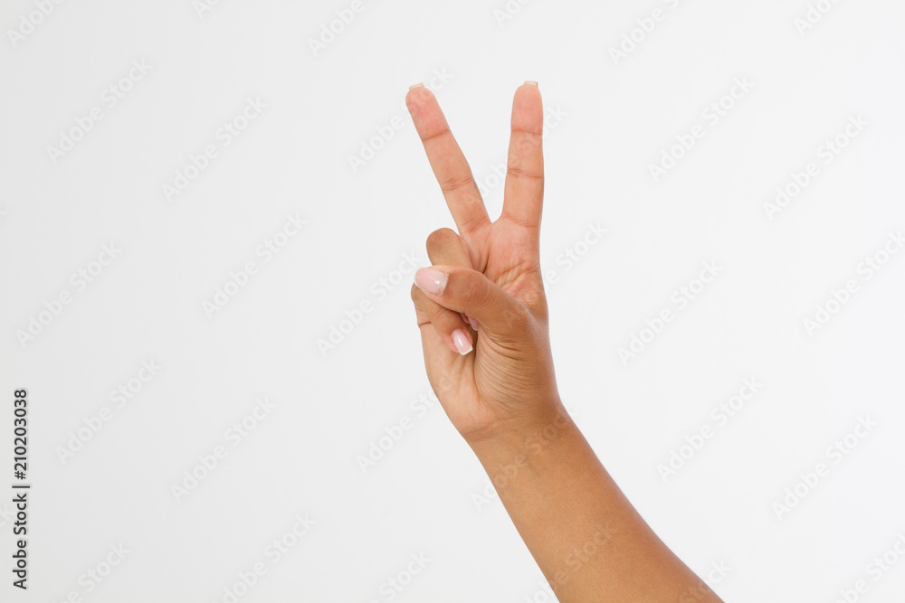 black Hand showing the sign of victory or peace closeup isolated on white background.Front view. Mock up. Copy space. Template. Blank. black Hand showing the sign of victory or peace closeup isolated on white background.Front view. Mock up. Copy space. Template. Blank.