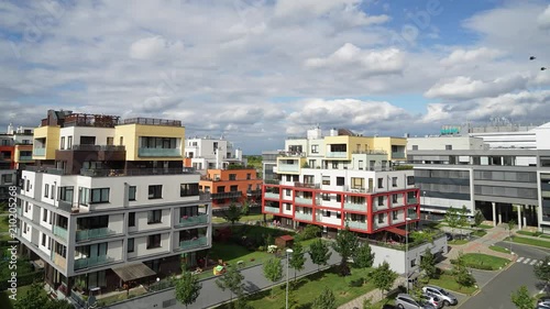 Timelapse of Dark Stormy clouds rolling over mixed residential and commercial district in Prague