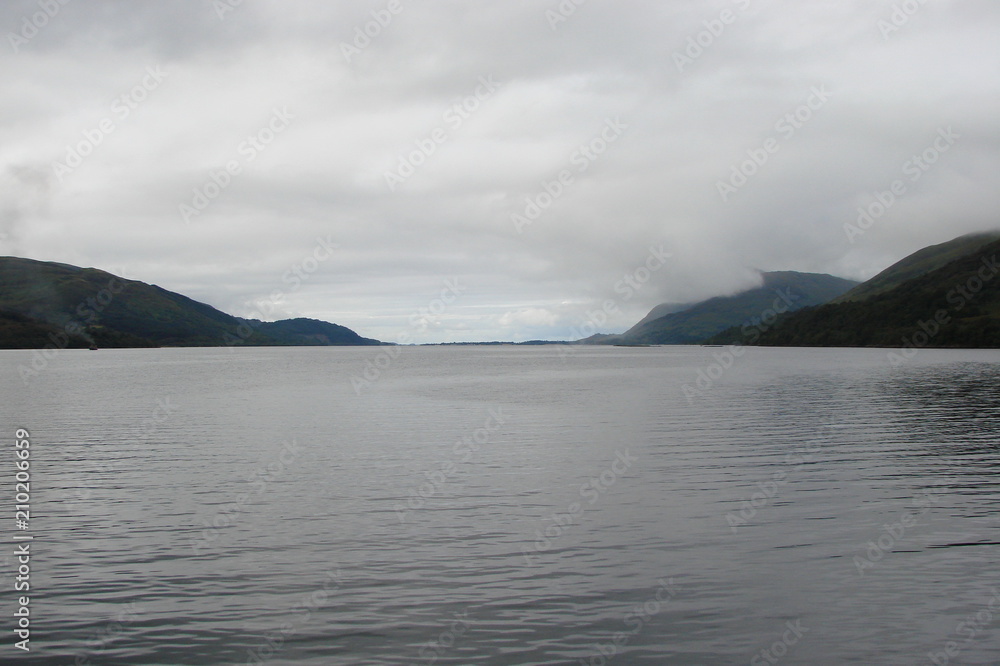 Panorama of the Gulf of Scotland Fjords against the background of the cloudy northern sky. Panorama of the Gulf of Scotland Fjords against the background of the cloudy northern sky.