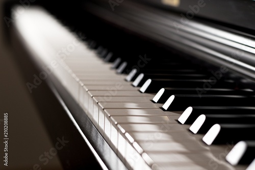 Shiny piano keyboard with light reflection