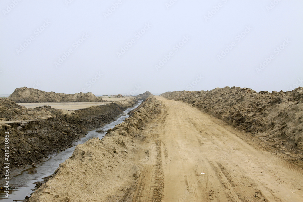 Dirt roads and drainage ditch Dirt roads and drainage ditch