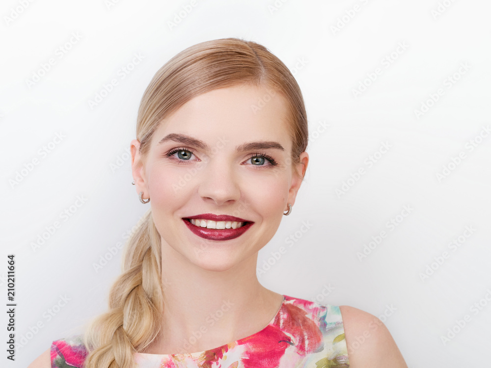 Beauty portrait of young beautiful cheerful young fresh looking woman with bright trendy make up blond healthy hair braid hairstyle. Beauty portrait of young beautiful cheerful young fresh looking woman with bright trendy make up blond healthy hair braid hairstyle.