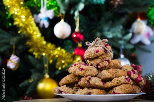 Christmas oatmeal cookies with berries on plate