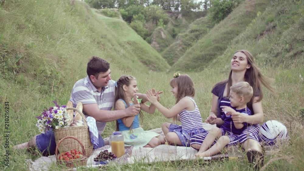 Happy european family have a rest on nature Happy european family have a rest on nature