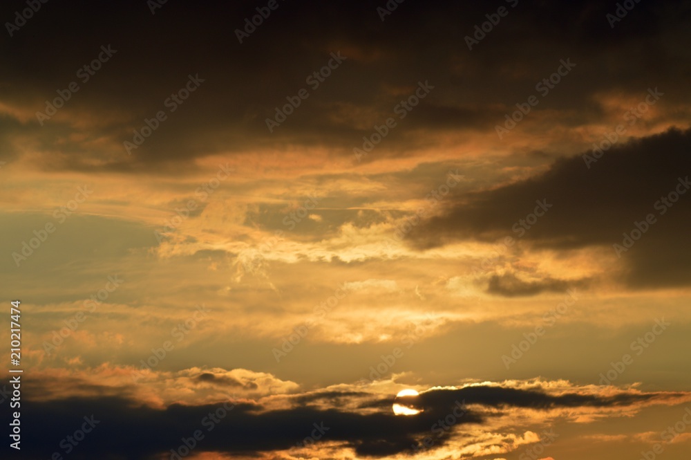 Sky with clouds and sunshine - sunset