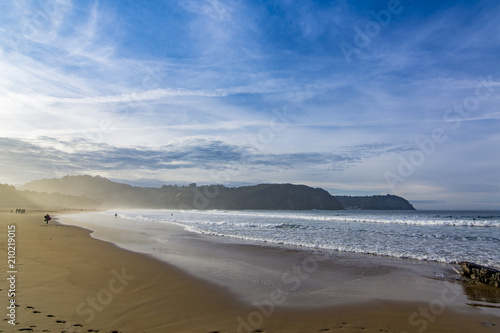 Atardecer en la playa de Rodiles en Asturias  photo