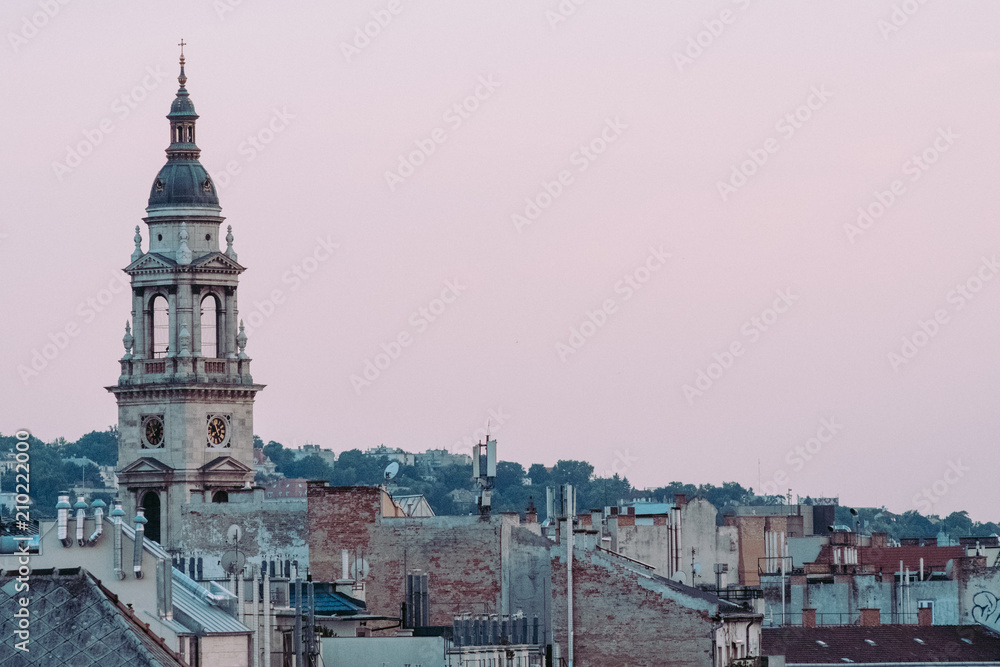 View of St. Stephen's Basilica with purple sky from a rooftop in Budapest, Hungary
