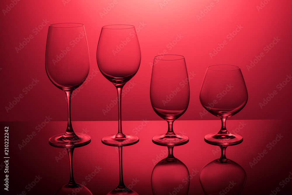Glasses on a red background.