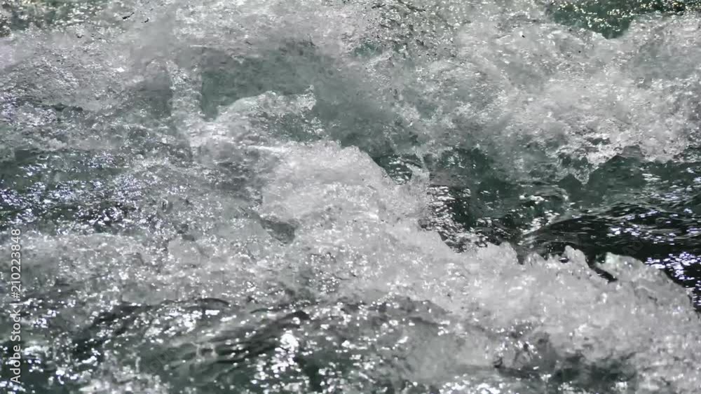 Water moving in a wild river with rocks in UHD resolution Stock Video ...