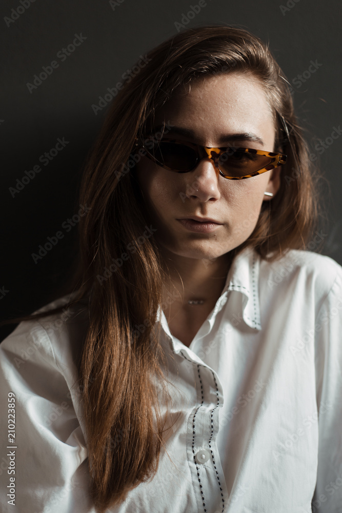 Portraits of beautiful brunette girl in sunglasses Portraits of beautiful brunette girl in sunglasses