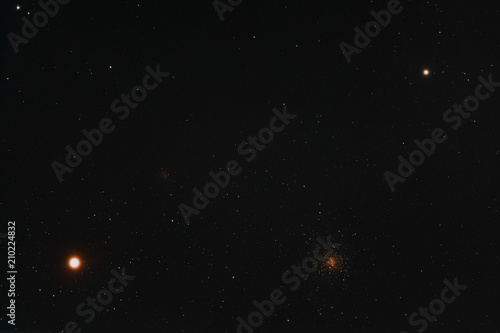 The two bright stars Antares and Alniyat  and the two globular clusters Messier 4 and NGC 6144 in constellation of Scorpius as seen from Mannheim in Germany.