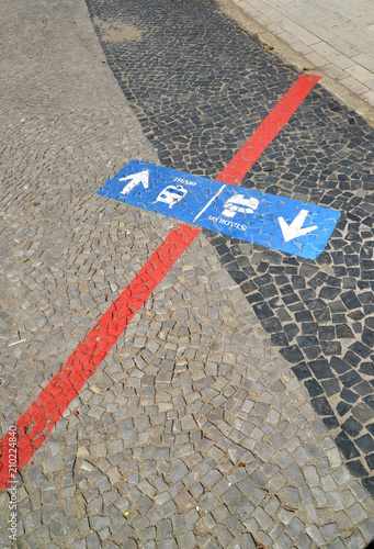 Direction sign of the movement on a stacked pavement for fans of the 2018 FIFA World Cup in Russia. Kaliningrad photo