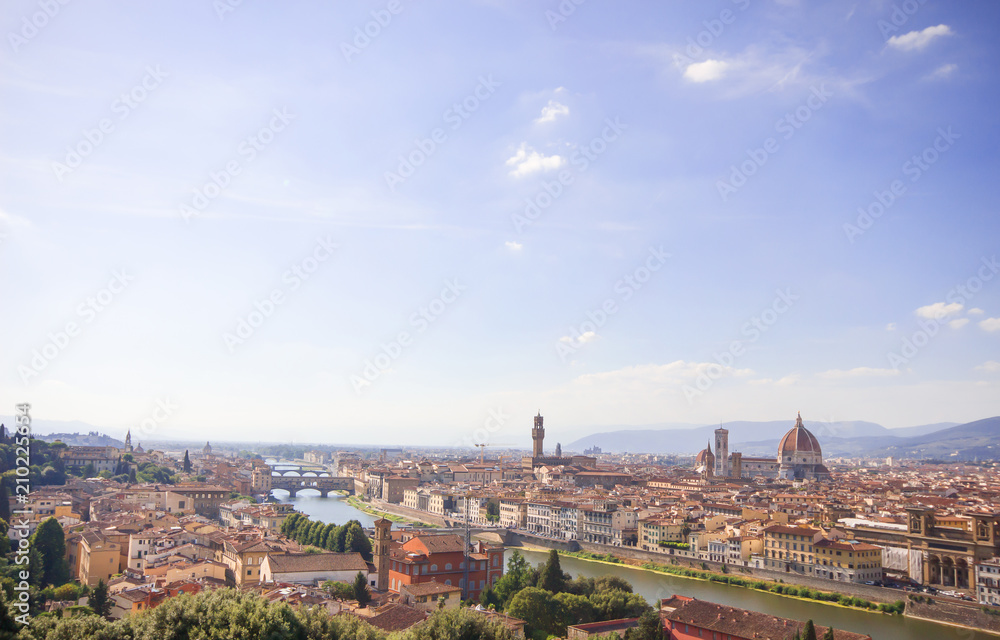 Beautiful cityscape skyline of Firenze (Florence), Italy, with the bridges over the river Arno, Italy landscape of florence with bright blue sky in spring time.