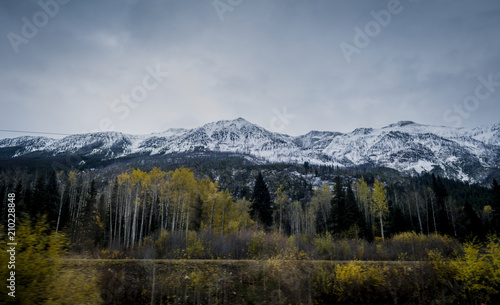 Look at snow covered Rocky Mountains in autumn