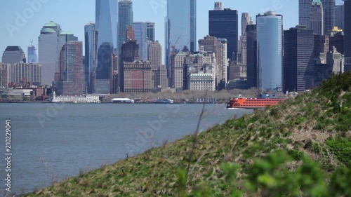 Hillside With Ferry Passing In NYC