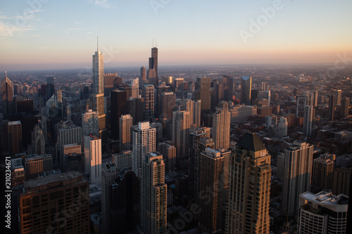 The Chicago City Skyline At Sunset From Above