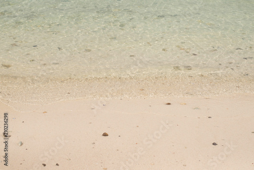 Clear water of the sea and sand beach.