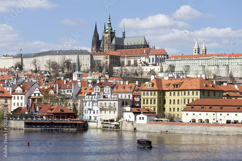 Spring Prague gothic Castle with the Lesser Town above River Vltava in the sunny Day, Czech Republic