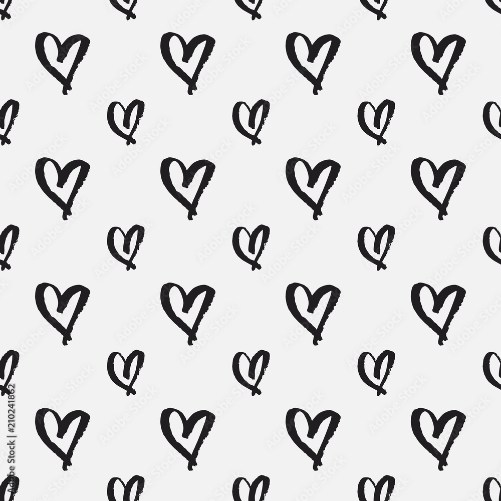 Hand drawn brush stroke hearts seamless vector pattern in black and white.