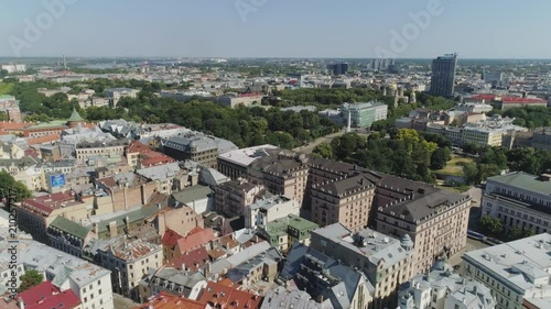 Riga city historical Old town and living houses and buildings with roads and cars traffic Drone flight photo