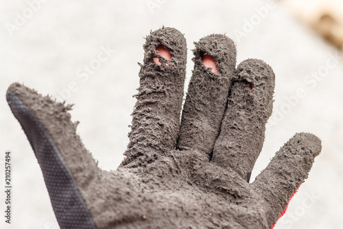 Broken work gloves / Broken by lifetime / Unprotected danger to hand. photo