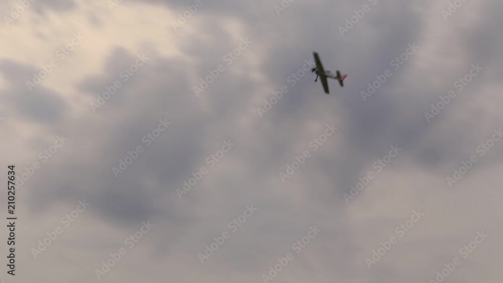 Model aircraft performs aerobatics in the sky Model aircraft performs aerobatics in the sky