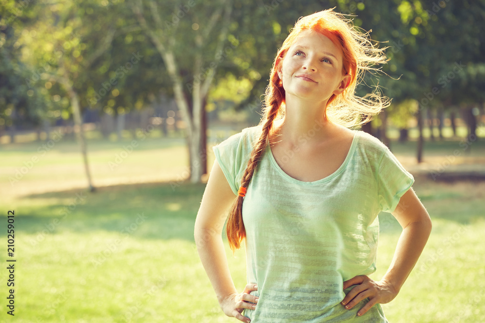 redhead woman in sunglasses
