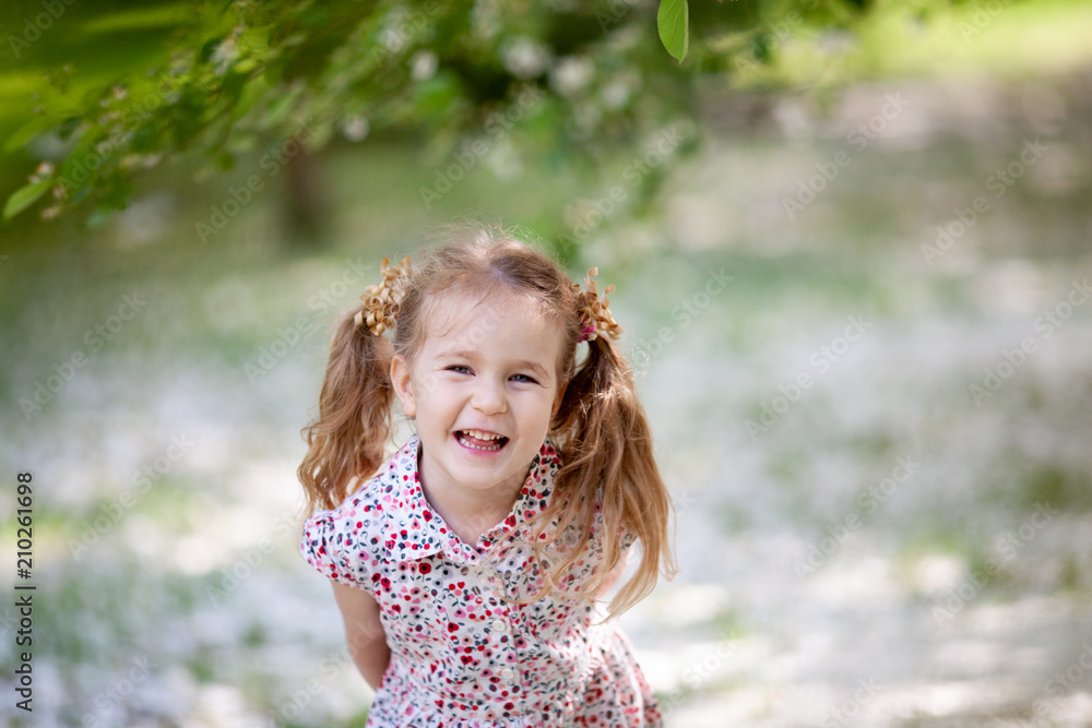 Little cute girl walking in summer park Little cute girl walking in summer park