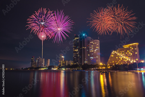 Fireworks celebration in Pattaya city at night time.