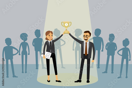 businessman and woman holding the winner cup together,success concept