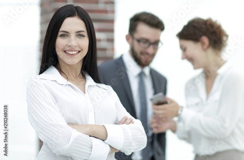 Wallpaper Mural close-up of a beautiful woman manager and co-workers in the office Torontodigital.ca