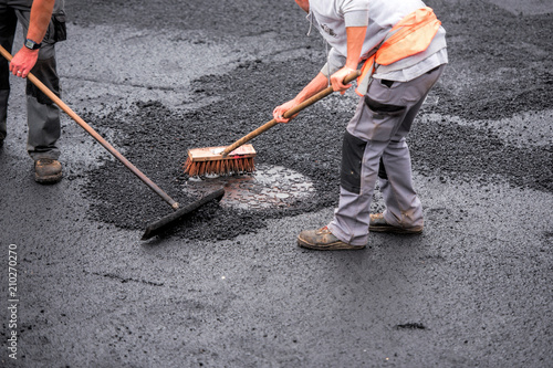 macadam worker on the road