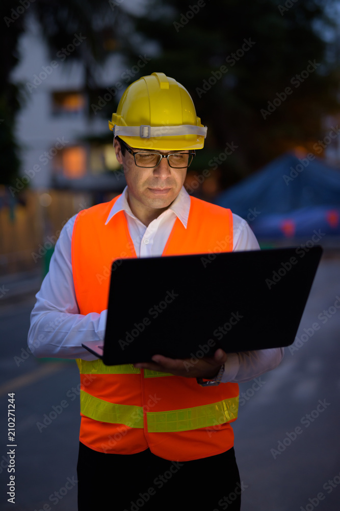 Handsome Persian man construction worker at the construction sit