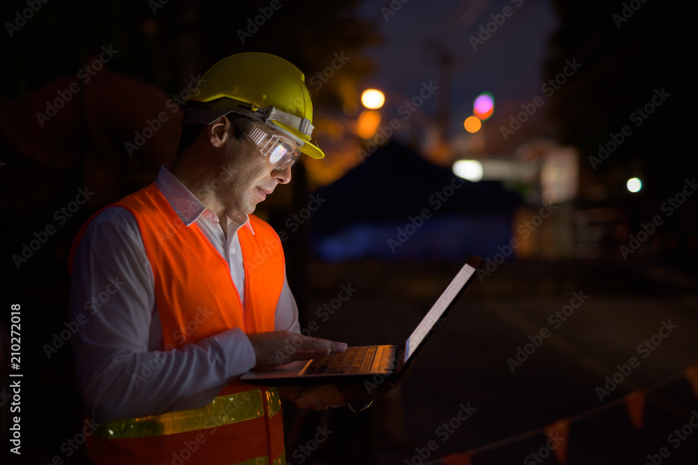 Handsome Persian man construction worker at the construction sit Handsome Persian man construction worker at the construction sit
