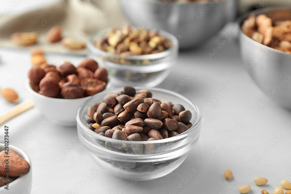 Bowl with tasty pine nuts on table Bowl with tasty pine nuts on table